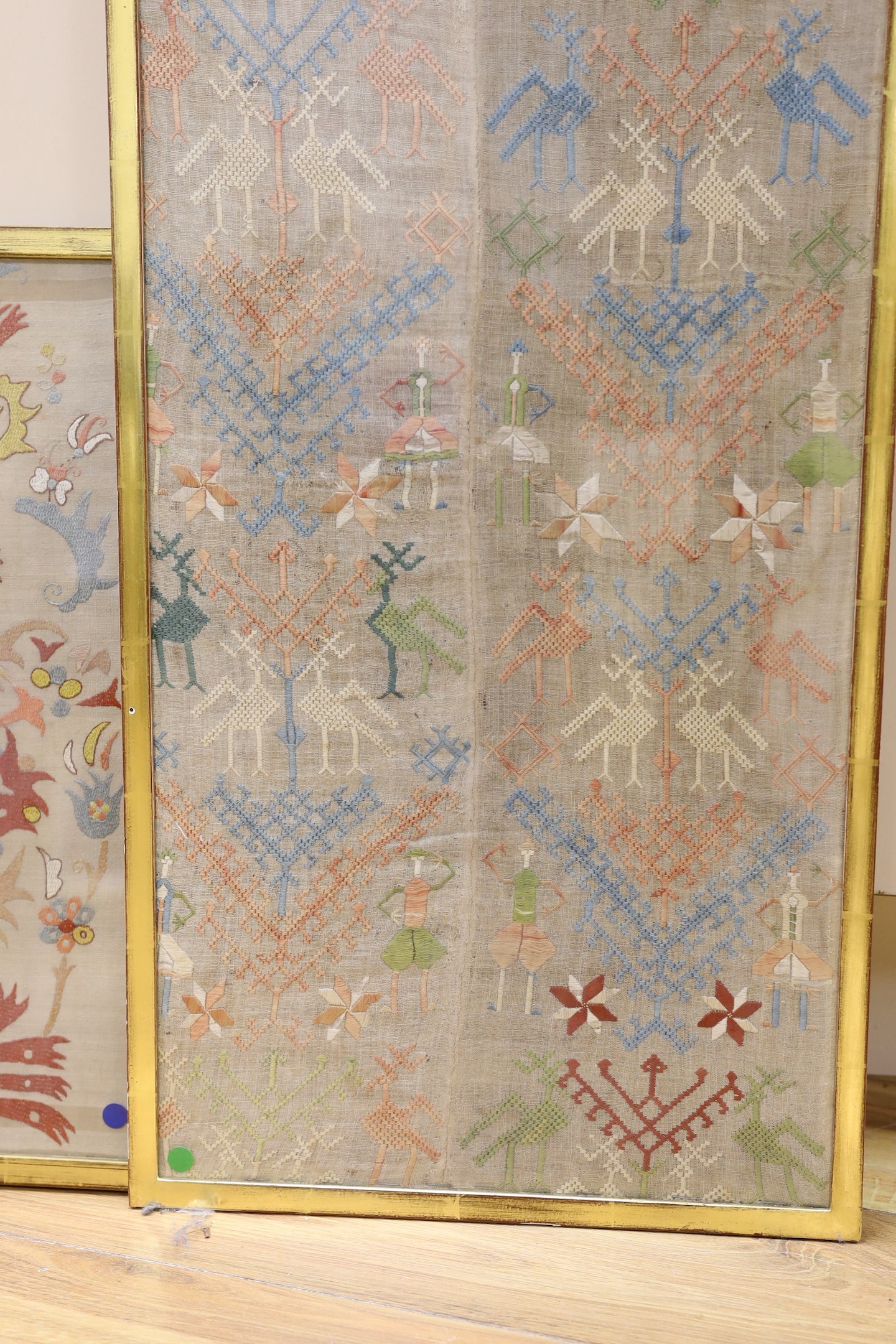 Two framed Greek needlework panels, largest 146x33cm excl frame